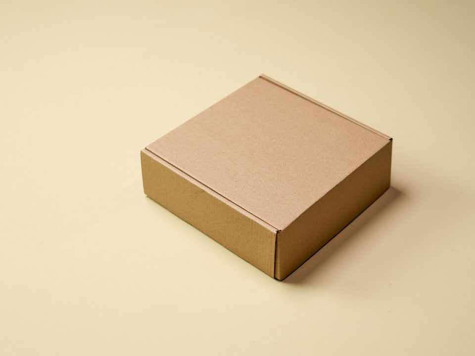 brown cardboard box on a table